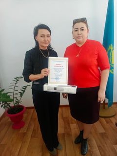 Меркі аудандық кәсіподақ комитетінің білім беру саласындағы қажырлы еңбегі мен ұжым  өміріндегі белсенділігі үшін 22 Наурыз-Ұлыстың Ұлы күні мерекесіне орай №23 Тескентоған ЖОББМ-нің тәлімгері Ануарбекова Назира Сатыбалдиевна Құрмет грамотамен марапа